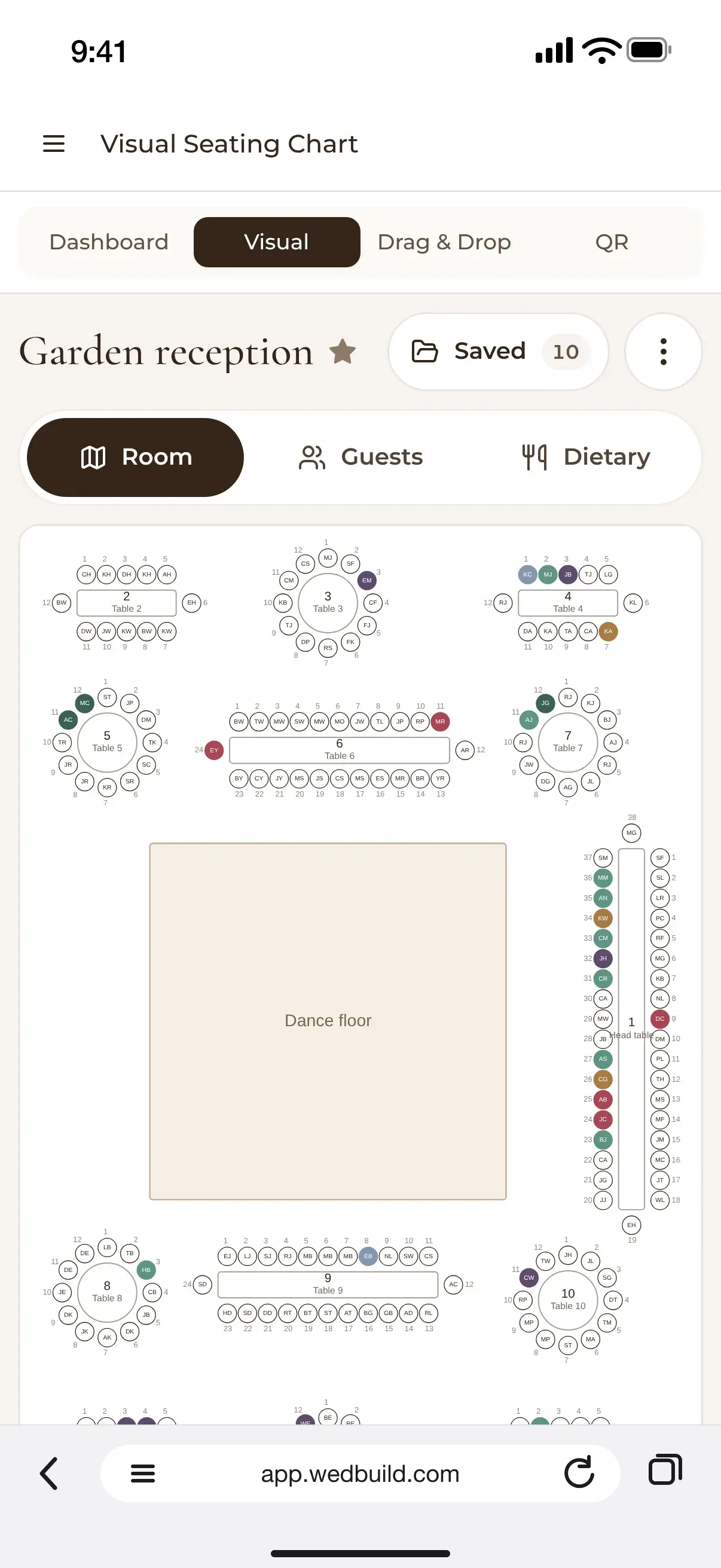 The visual seating chart on a phone: Garden reception, tables around the dance floor, 205 of 219 guests seated
